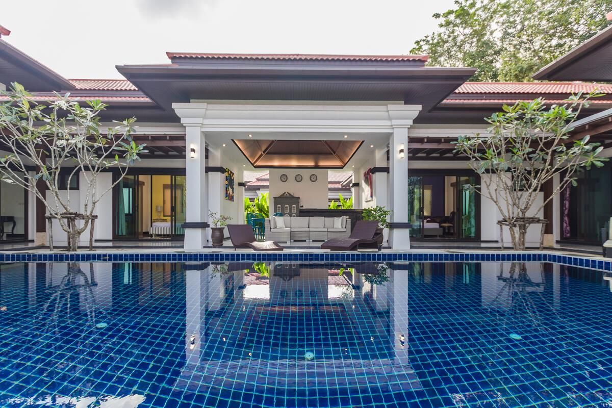 Villa with colourful paintings of famous Thai artists